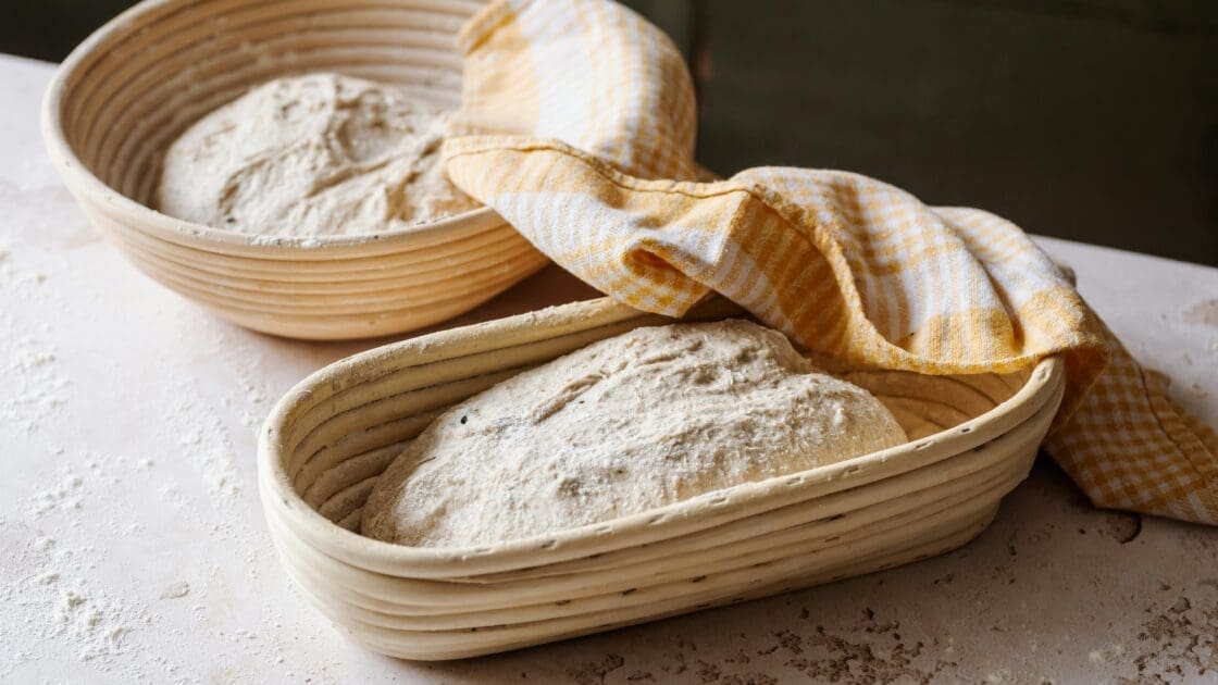 image of two loaves of bread with white wheat flour