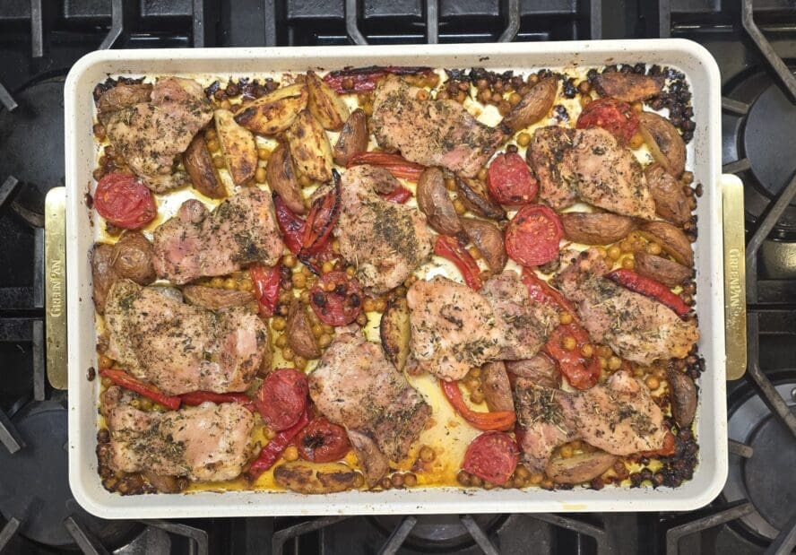 Image of the GreenPan Reserve half sheet baking pan with roasted chicken and veg from Laura Klein's tests.