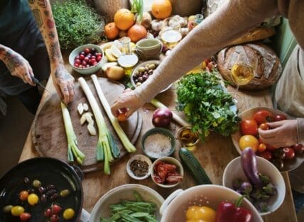 Image of a bountiful spread of vegetables that fall into a high-fiber diet, displayed on a table.