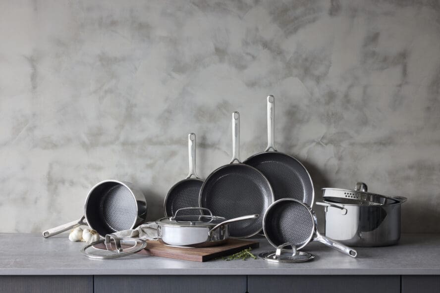 Image of a GreenPan Spectra set displayed against a grey kitchen backdrop.