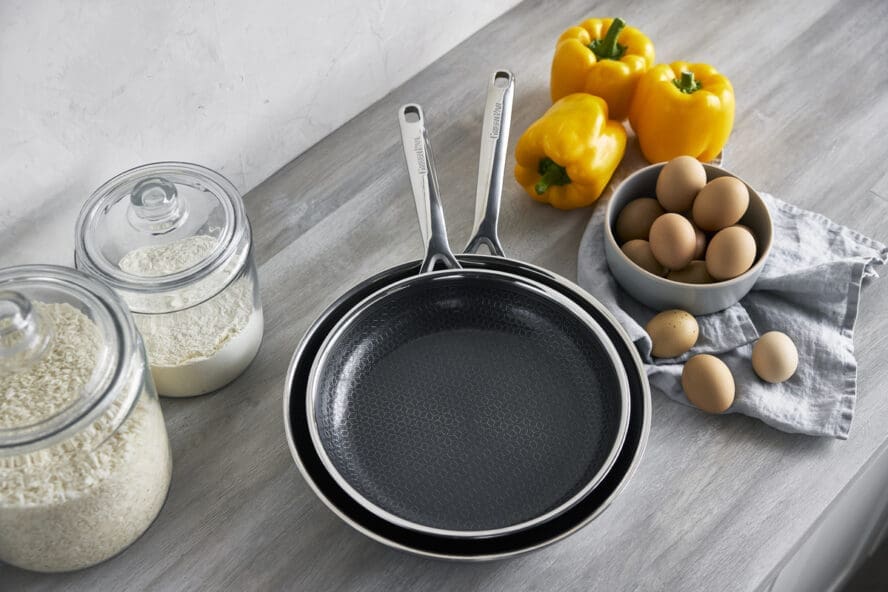 Image of the GreenPan Spectra frypan duo, nested in each other with the etched stainless steel surface showing.