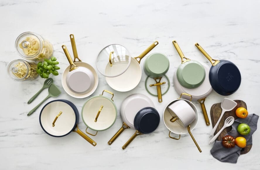 Image of an overhead view of different pieces of GreenPan Reserve Pro non-toxic cookware pieces on a marble countertop