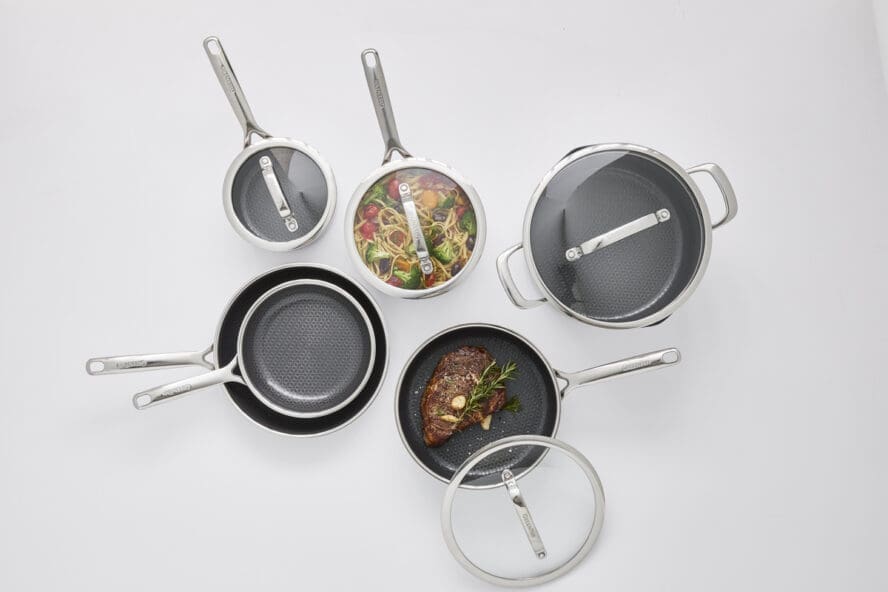 Overhead image of pieces in the GreenPan Spectra line, including frypans, a stockpot, sauté pan, and more.
