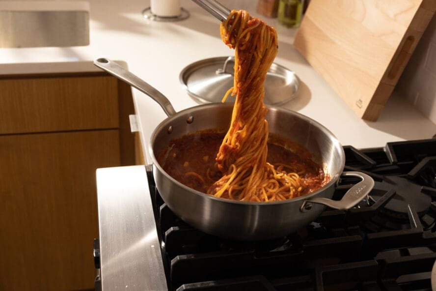 Image of spaghetti being made in a Made In stainless steel sauce pan.